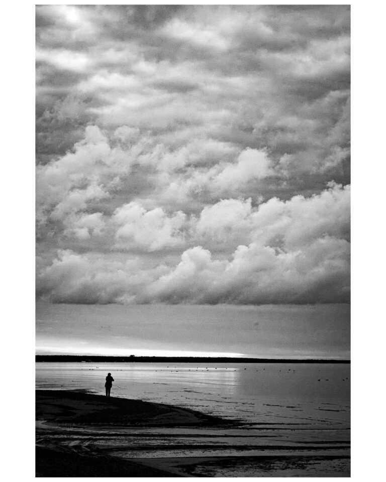 An image of a cloudy evening by the seashore